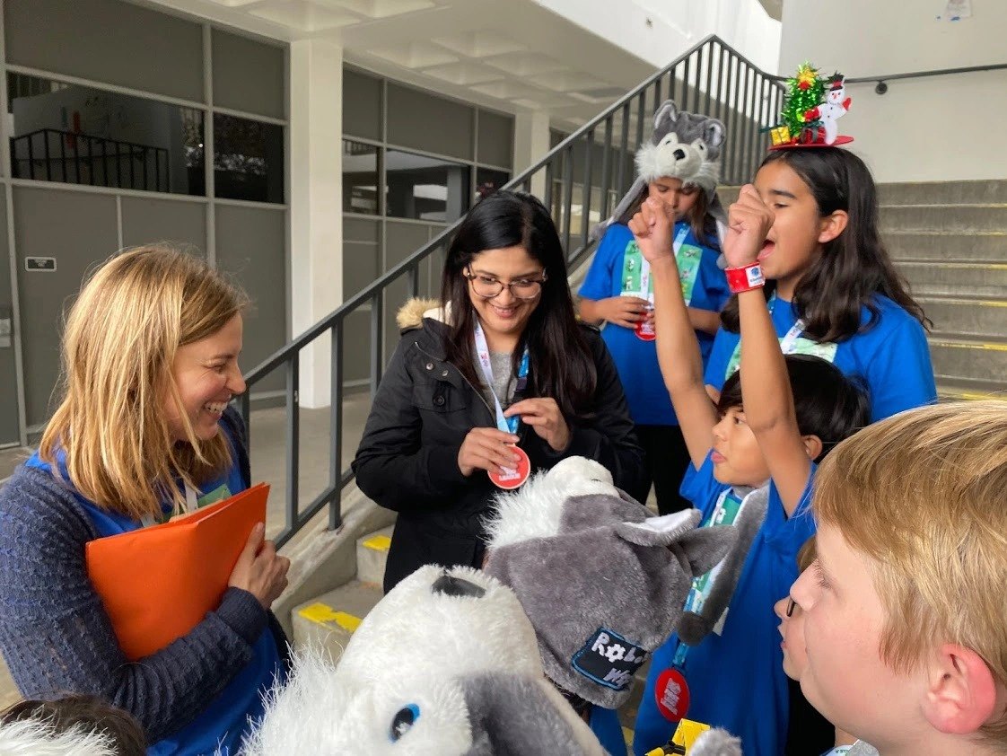 Coach Melissa Madsen with Code N Bots students